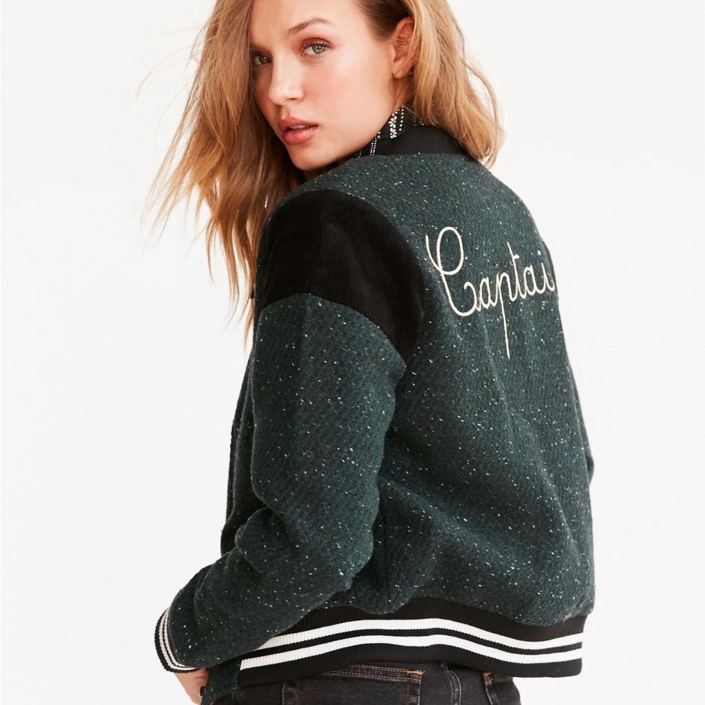 Never worn captain varsity jacket XS